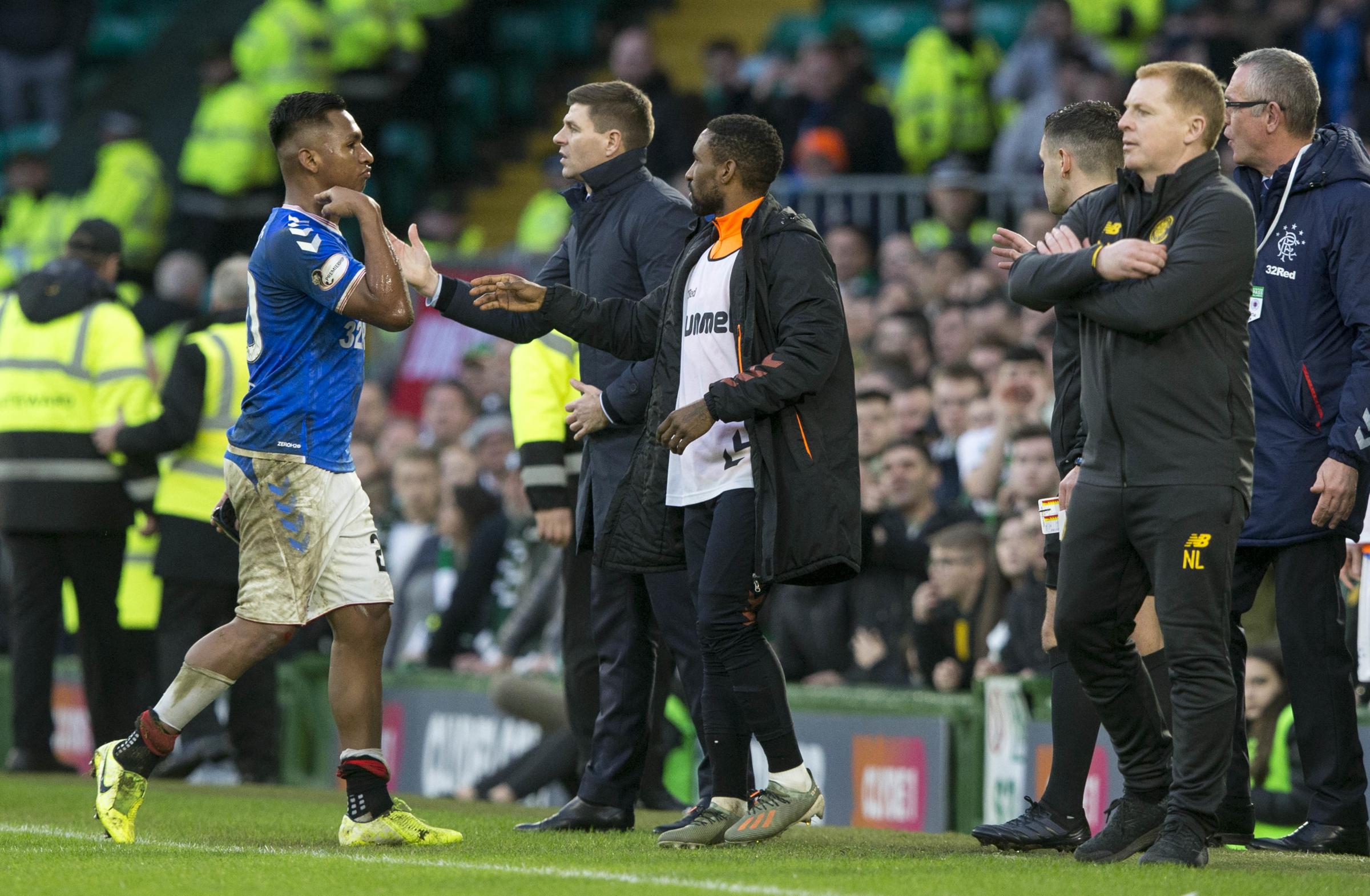 Alfredo Morelos appears to make throat-slitting gesture towards Celtic fans after red card