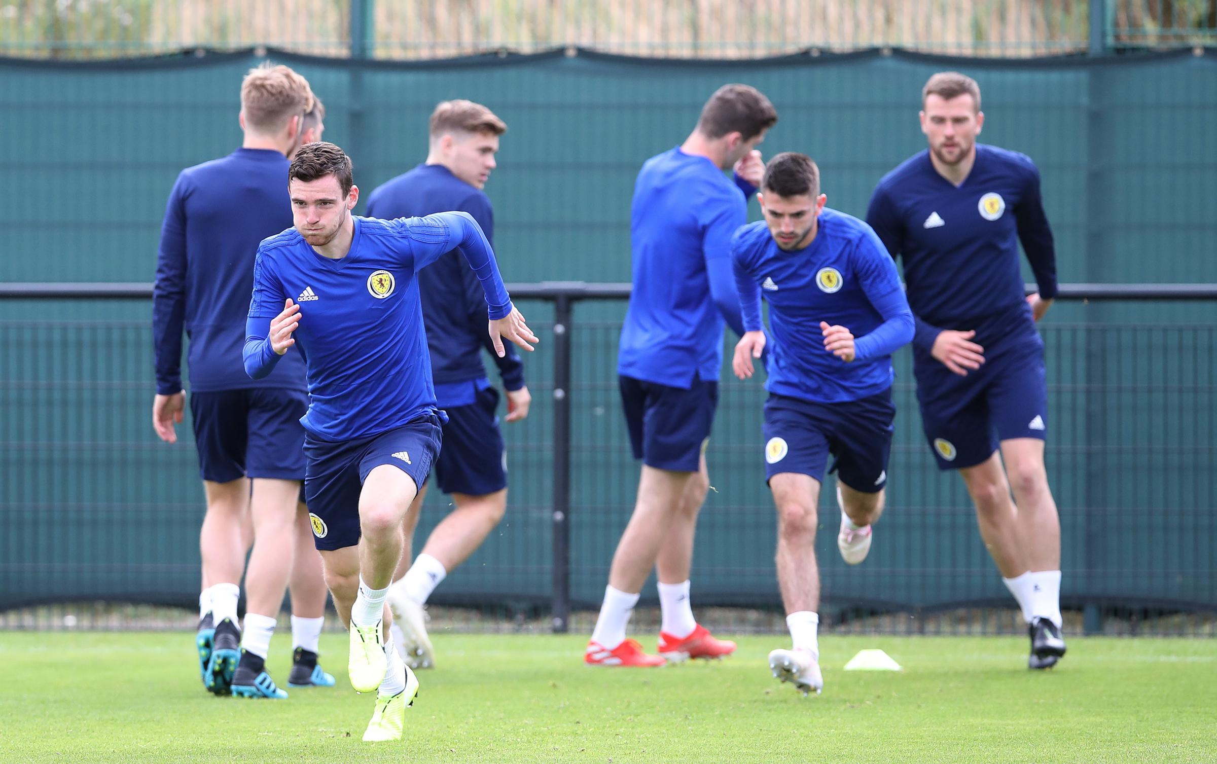 Greg Taylor congratulated by Liverpool star Andy Robertson after Celtic turn screw on Rangers