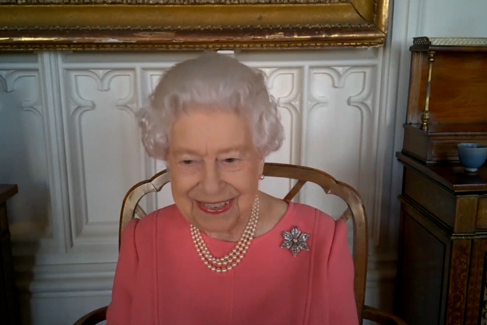 The Queen urges those who are uncertain about the coronavirus jab to “think about others”