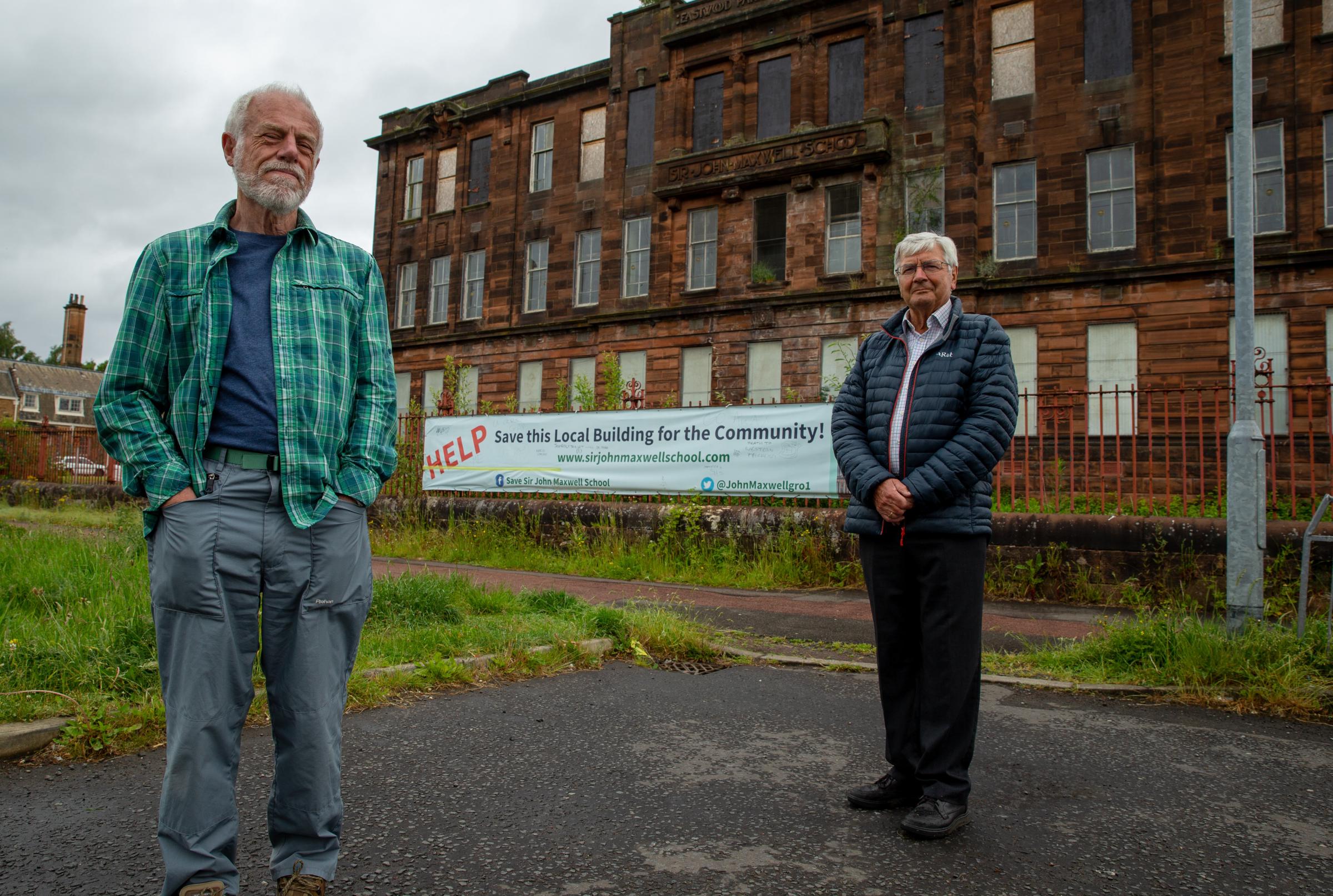 Bob Marshall, left and Douglas McCreath, of the Sir John Maxwell School Trust pictured outside the former primary school in Pollokshaws, Glasgow. Photograph by Colin Mearns.