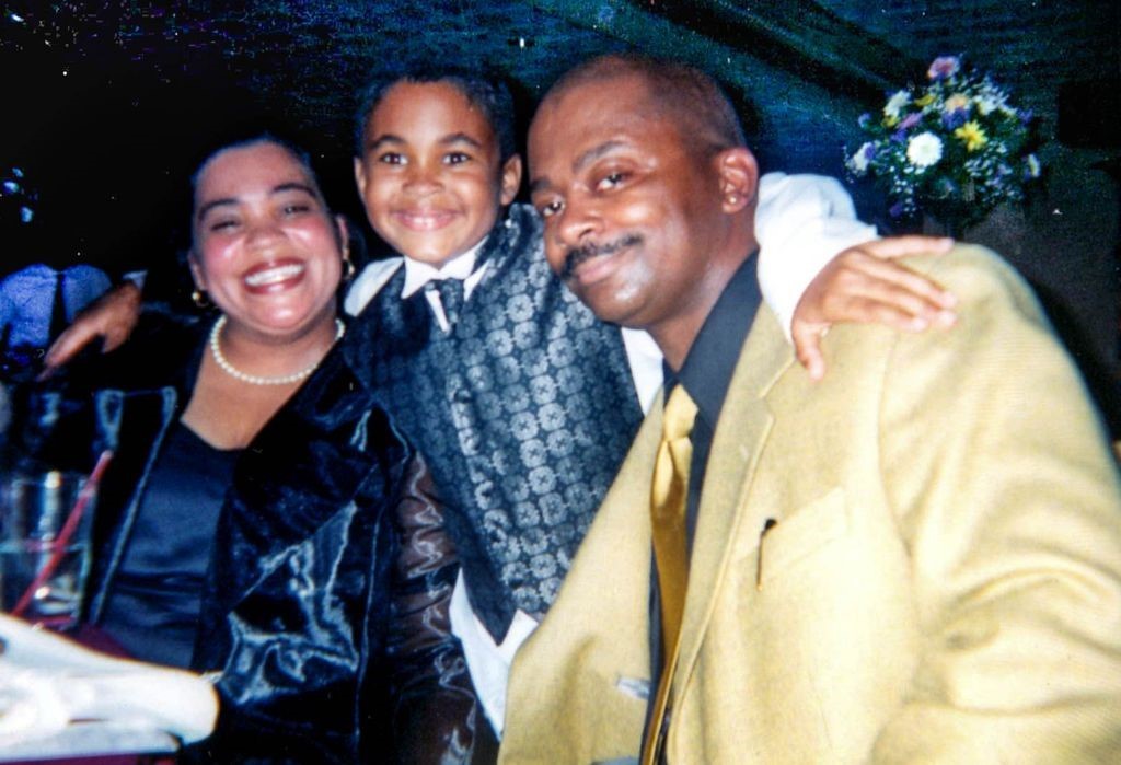 Clinton Davis was proud to serve with the Port Authority Police Department. Pictured with his wife Simone and son Julian.