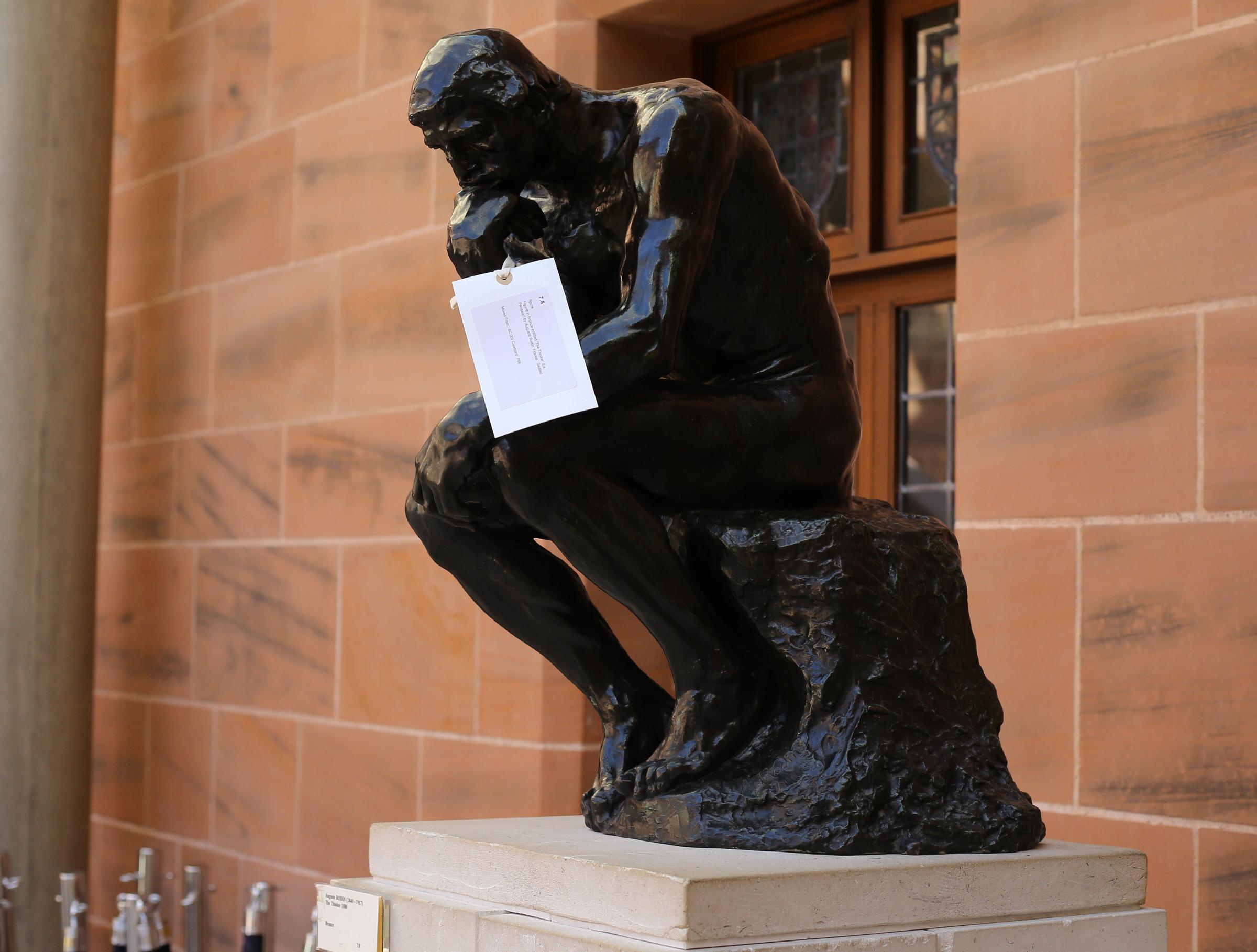 Decant of the contents of the Burrell collection ahead of its refurbishment.. The Thinker by Rodin pictured with a label. Photograph by Colin Mearns.