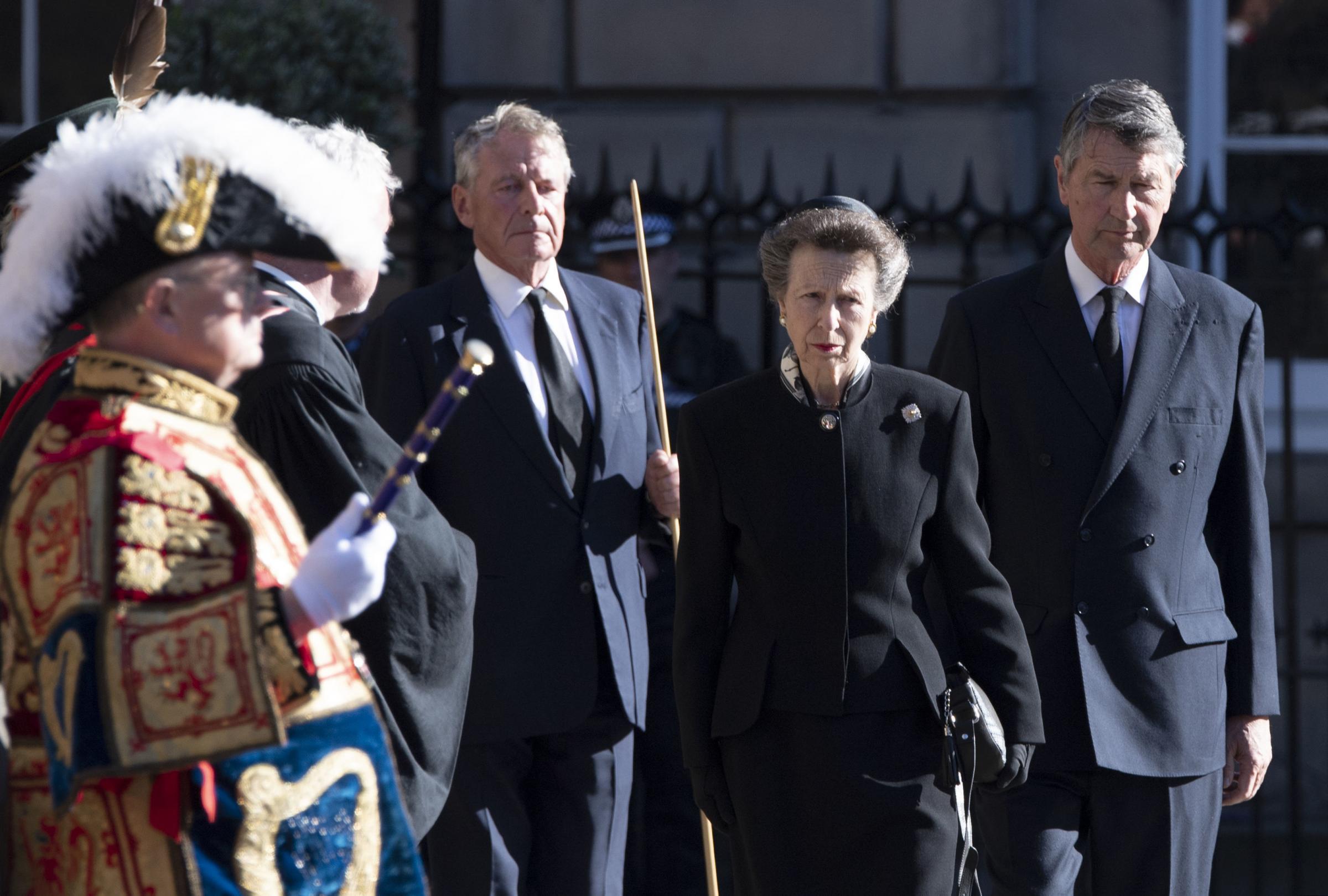 The Princess Royal and Vice Admiral Sir Timothy Laurence after the coffin of Queen Elizabeth was taken to a hearse as it departs St Giles Cathedral. Photo credit: Lesley Martin/PA Wire 